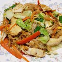 Fried Vermicelli (Kya Zan Kyaw) · Stir-fried rice noodle with chicken, egg, napa cabbage, carrot, Chinese celery, garlic and r...