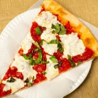 Margherita Pizza · San Marzano tomato, fresh Mozzarella, basil, olive oil and garlic with Reggiano Parmigiano o...