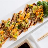 Sushi Pizza · Spicy salmon, mango, avocado crunchy, tobiko with eel sauce and spicy mayo. Spicy.