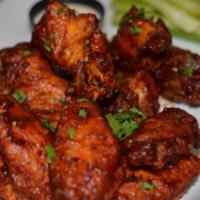 Buffalo Wings · Choice of Buffalo Sauce (mild or hot), Teriyaki, Garlic Parmesan, Jerk, Sweet Chili, BBQ or ...