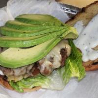 Avocado Ranch · 9oz 100% beef patty, avocado, swiss cheese, lettuce, tomato & ranch dressing on a toasted br...