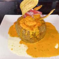 Shrimp Mofongo · Plantains are fried, then mashed with pork rinds, salt, garlic, and oil. Topped with mozzare...