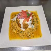 Chicken Mofongo · Plantains are fried, then mashed with pork rinds, salt, garlic, and oil. Topped with mozzare...