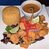 Chicharron De Pollo Diner · Crispy fried chunks of breaded chicken breasts served with two of our delicious sides.