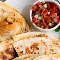 Quesadillas · Steak, chicken, shrimps or beef. Add peppers, onions for additional charges.