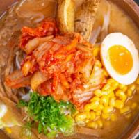 Kimchi · Noodles, bean sprouts, cabbabe, scallion, corn, fried potato, menma, miso egg & kimchi.