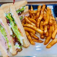 The Blt Club Sandwich Combo · Served as a TRIPPLE DECKER sandwich served with choice of Roast Beef or Turkey, with bacon, ...