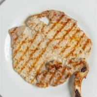 Grilled Pork Chops · Grilled pork chops served with peppers, mushrooms and sautéed onions.