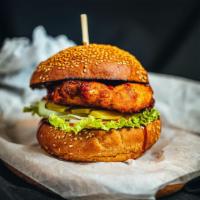 Bbq Crispy Chicken Burger · The chicken is marinated overnight in buttermilk, then dipped in a breadcrumb to achieve the...