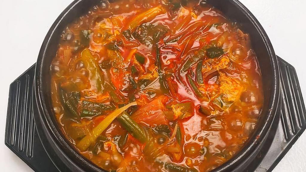 육개장 (Yook Ge Jang) · Spicy beef soup.