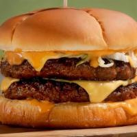 Beyond Burger · Like the bonus room burger but beyond. Served on a potato bun with a side of tater tots.
