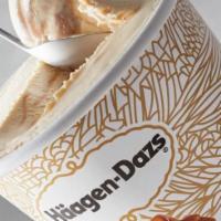 Dulce Dazzler · Dulce de leche ice cream layered with bananas and warm caramel topped with whipped cream car...