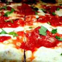 Margarita Pizza · Fresh mozzarella, fresh crushed tomatoes, fresh basil, drizzled with olive oil.