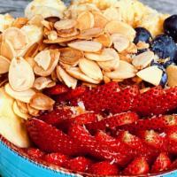 Yogurt Bowl · Granola, raspberries, pomegranate seeds, almonds, citrus honey