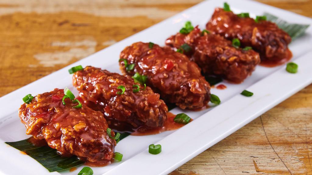 Dancing Wing · Crispy chicken wings tossed in homemade sweet and sour sauce.