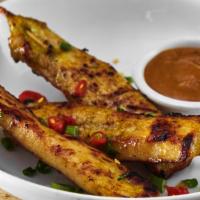 Chicken Satay · Marinated grilled chicken on skewer and peanut sauce.
