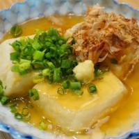 House Made Agedashi Tofu · Tofu, green onion, ginger, bonito, dashi.