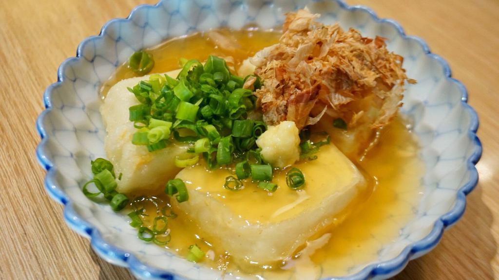 House Made Agedashi Tofu · Tofu, green onion, ginger, bonito, dashi.