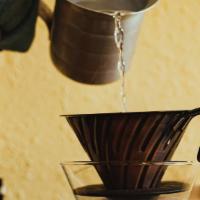 Pour Over · 225 gr of hot filtered water Poured over elegantly over 16 gr of perfectly roasted coffee gr...