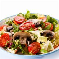 Portobello Mushroom House Garden Salad · Fresh crispy leaf lettuce, romaine lettuce, cucumbers, carrots, tomatoes and fresh bell pepp...