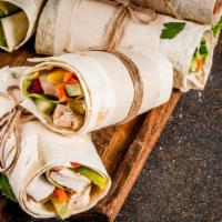 Chicken Fajita Wrap · Nicely marinated grilled chicken with peppers, caramelized onions, salsa and cheddar cheese ...