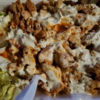 Mixed Platter · Lamb and Chicken Mixed on top of rice and salad with any sauce.