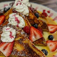 Brioche French Toast · Housemade creme anglaise, powdered
sugar, maple syrup, hibiscus syrup,
seasonal fruit