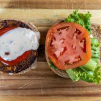 Black Bean Burger · Black bean burger, whole wheat burger bun, lettuce, tomato, vegan ketchup,  vegan mayonnaise...