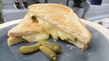 Jalapeno Cheddar Grilled Cheese · Sharp white Cheddar melted on a lightly buttered French pullman bread with sliced jalapeños.