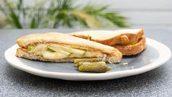 Apple Cheddar Grilled Cheese · Sliced green apples, guava jam in melted harp white Cheddar. Served on French white bread.