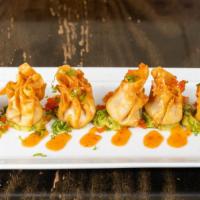 Spicy Tuna Gyoza · Spicy. Served crispy, sweet chili emulsion, and lime spiked guacamole.