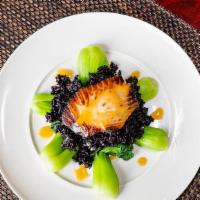 Miso Black Cod Appetizer · Grilled miso marinated black cod served on black rice and steamed bok choy.