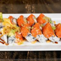 Spider Web Roll · Soft shell crab, avocado, cucumber inside, wrapped with spicy tuna and wasabi tobiko.