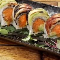 Godzilla · Spicy Crunchy Salmon and Avocado.Wrapped inside out and Topped with Smoked Eel and Avocado