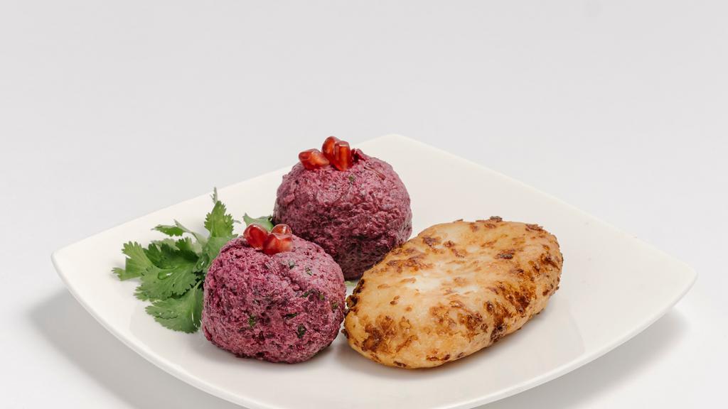 Beets With Walnuts  · Chopped and minced cooked beets with walnuts (vegan).
Optional- Served with Chvishtari (2 Pieces of Cornbread with cheese). Vegetarian and gluten free.