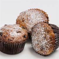 Vegan Walnut Muffin  · An individual cup-shaped good filled with walnuts, grounded oranges & lemons, dried cranberr...