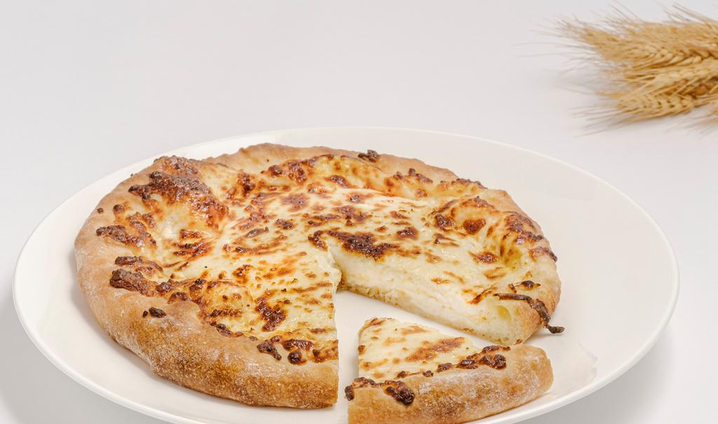  Megruli Khachapuri  · Traditional Georgian double cheese pie with a rich top layer of crusted cheese. Vegetarian.