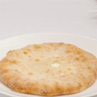 Imeruli Khachapuri  · Flatbread/Pie with melted cheese filling demonstrating timeless signature of Georgian culina...