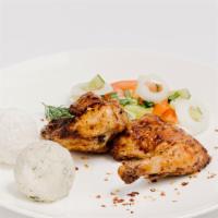 Tabaka · Marinated oven fried chicken with Georgian spices. Served with salad, rice or mashed potatoes.