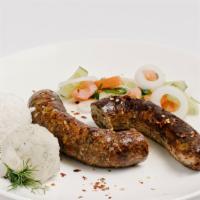 Kupati · Slightly spicy beef & pork sausage with district flavor of enriched Georgian herbs. Served w...