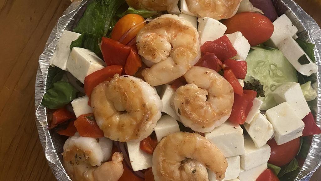 Grilled Shrimp Romaine Salad · Grilled shrimp, romaine lettuce, fresh mozzarella, roasted red peepers, tomatoes, olives, red onions and balsamic vinaigrette.