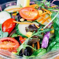 Mix Green Salad · Lightly dressed (olive oil, salt and paper) spring mix salad with tomatoes, cucumber, carrots,