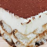 Tiramisu · Coffee soaked cake with chocolate and mascarpone cheese. a coffee-flavored italian dessert. ...