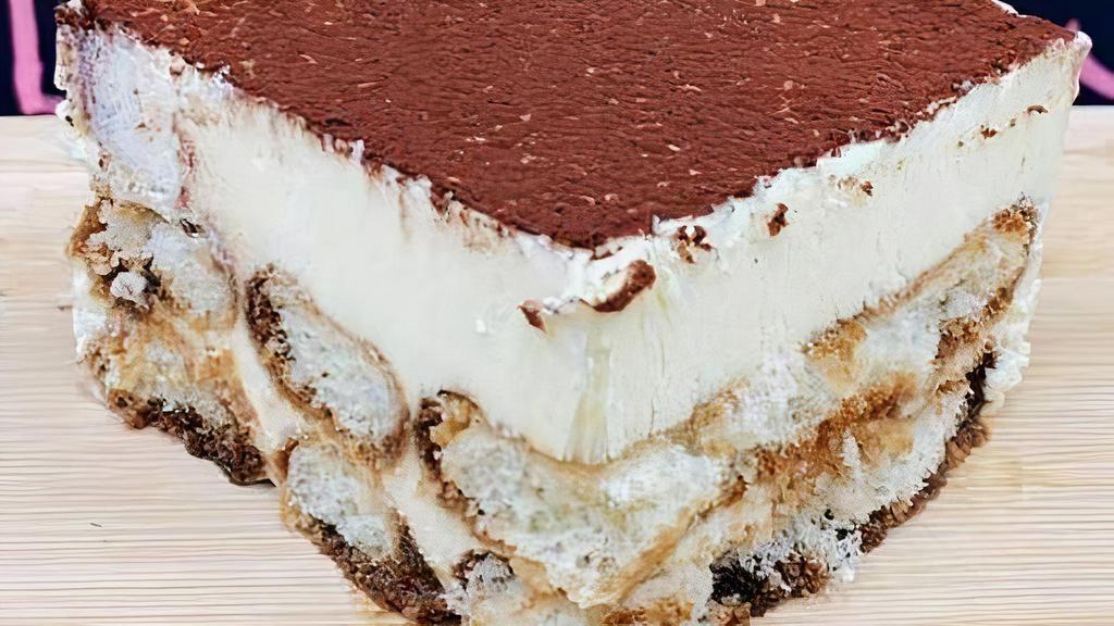 Tiramisu · Coffee soaked cake with chocolate and mascarpone cheese. a coffee-flavored italian dessert. it is made of ladyfingers (savoiardi) dipped in coffee layered with a whipped mixture of eggs sugar and mascarpone cheese flavored with cocoa.