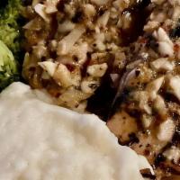 Mediterranean Chicken · All natural chicken breast grilled and brushed with olive oil, garlic, and herbs, served wit...