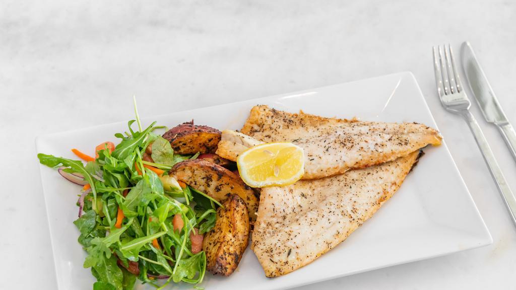 Wild-Caught Fillet Branzino · Branzino baked with garlic thyme butter topped with the garlic dijon olive oil served with arugula salad & roasted red skin potatoes.