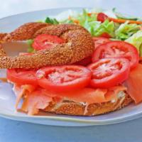 Simit Sandwich · Smoked salmon, cream cheese, tomato. Served with salad and pickles. Add avocado and turkey b...