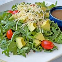 Arugula Salad · Gluten-free. Arugula salad with red quinoa, cherry tomatoes, avocado, parmesan cheese. Add c...