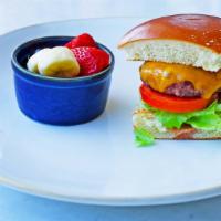 Kids Burger · House ground beef tenderloin, pan-seared & served on a brioche bun with lettuce, tomato, oni...