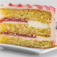 Vanilla Strawberry Cake · Light vanilla cake filled with strawberry sauce and fluffy strawberry cream.